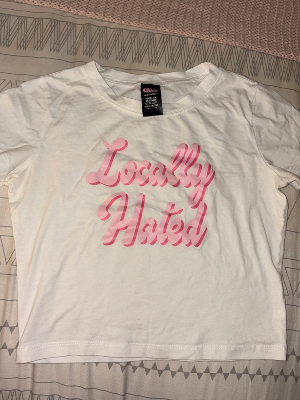 White Crop Tee with Pink "Locally Hated" Script